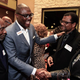 Frank Scott, middle, talking with supporters in Little Rock, Arkansas